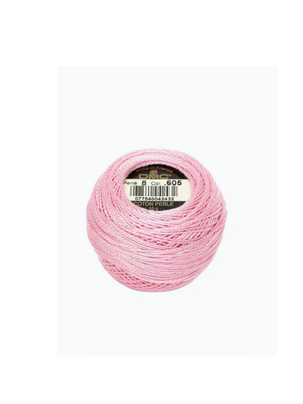 A ball of Dmc helmilanka nro 8 light pink cotton perle embroidery thread with satin sheen, topped by a label showing the brand, color number 605, and product details.
