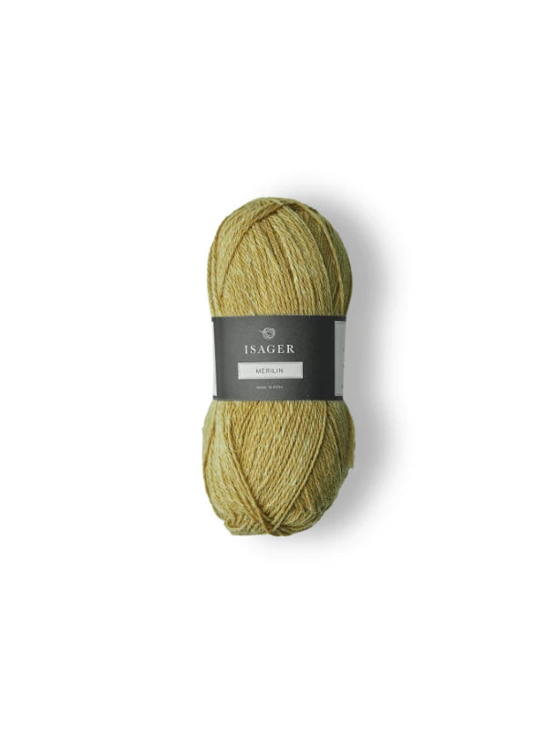 A skein of light olive green Isager Merlin yarn with a black and gray paper band is displayed on a white background.