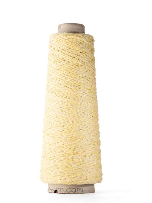 A cone-shaped spool of pale yellow Ito Kinu, 100% silkki yarn, stands upright against a white background. The japanilainen silkkilanka is tightly wound around a cardboard core—perfect for kesäneuleisiin.