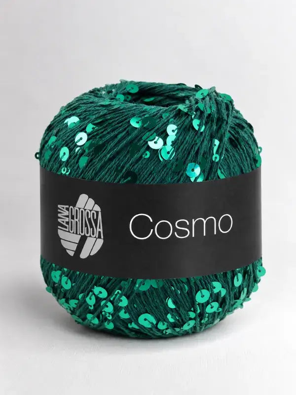 A ball of dark green Lana Grossa Cosmo yarn embellished with matching green sequins and a black product label.