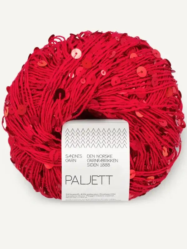 A round ball of vibrant red Sandnes Garn Paljett yarn embellished with scattered matching sequins, featuring a central product label.