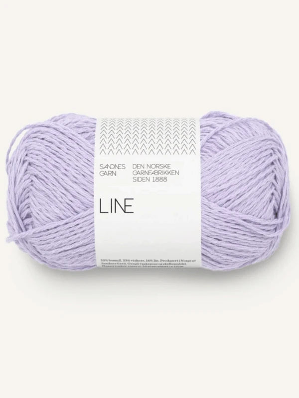 A skein of Sandnes Garn Line in light purple with a white label, ideal for the Elodie Tee knitting pattern (ENG). Great paired with mint green or used to check garment measurements.