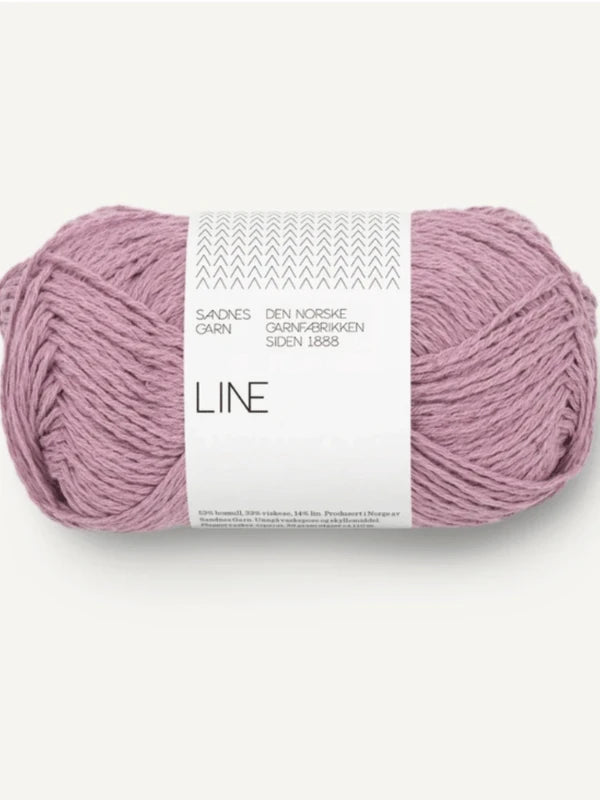 A skein of Sandnes Garn Line yarn in light purple with a Norwegian label—ideal for knitting the PetiteKnit Anker's Summer Shirt or your next neulesetti project.