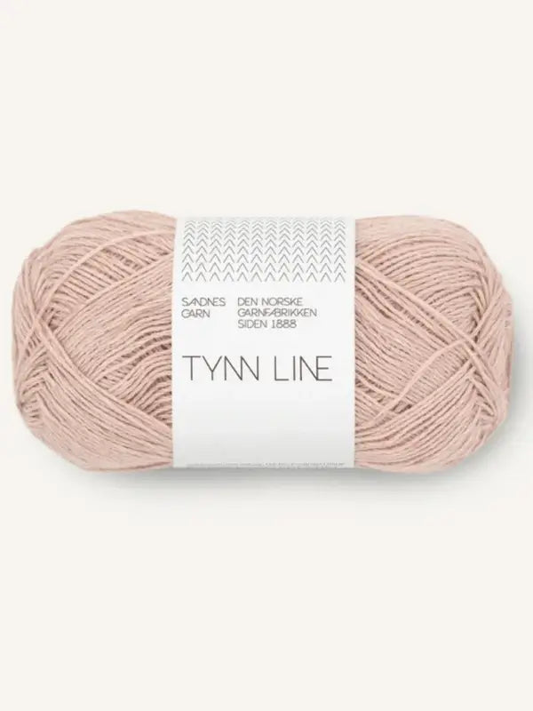 A light pink fingering-weight yarn ball with a white label reading Sandnes Garn Tynn Line, featuring gray text and patterns; ideal for your next summer knitting project.