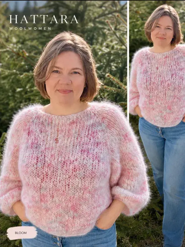 A woman wearing a fuzzy pink sweater made from the Hattara neuleohje stands outdoors in front of green trees, smiling at the camera. Knitted saumaton ylhäältä alas with soft Fluff Mohair, this cozy sweater embodies both comfort and style. The words Hattara Woolwomen appear at the top of the image.