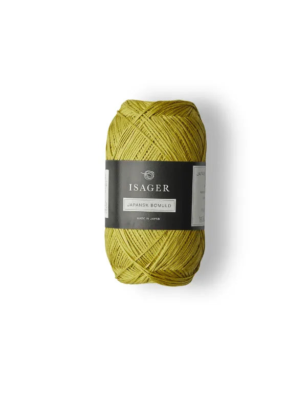 A skein of yellow Isager Japansk Bomuld yarn with a black and gray label, shown on a white background—ideal for your summer knitting projects.