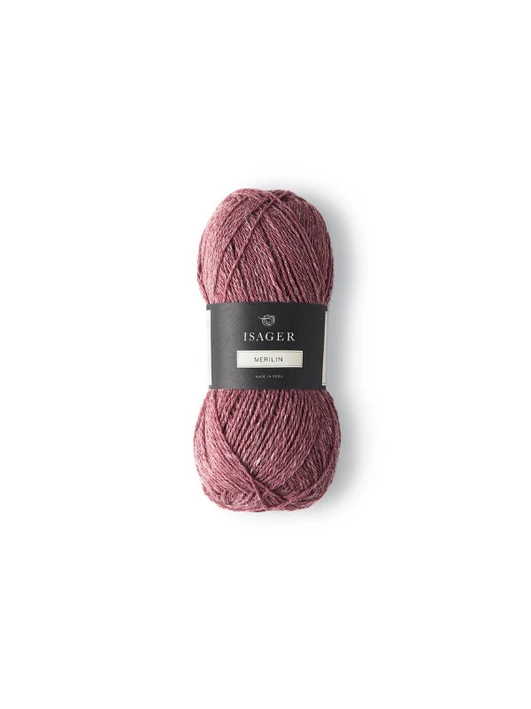 Pinkish-burgundy skein of Isager Merlin yarn with a black and white label, displayed on a white background.