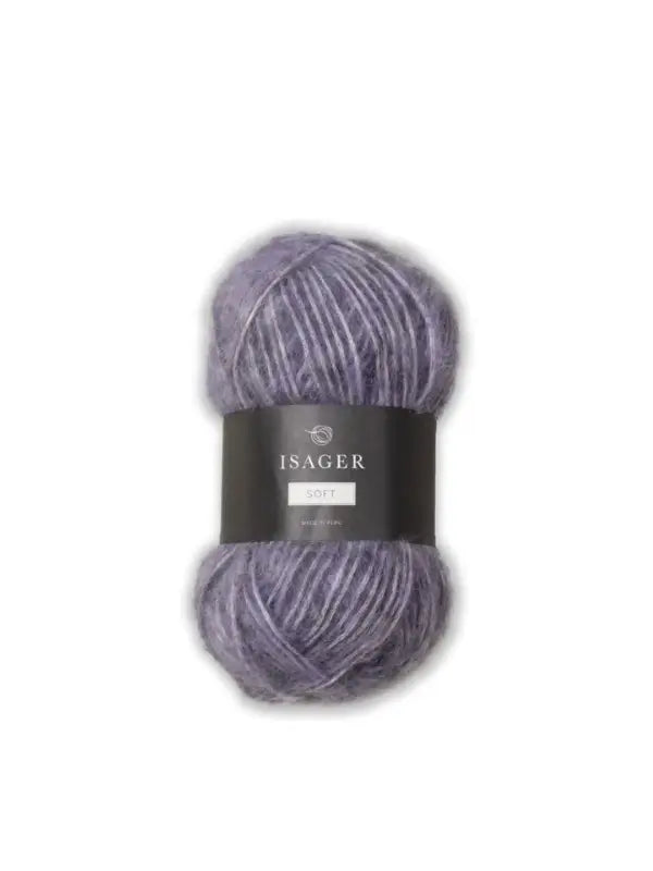 A skein of soft, purple yarn with a black label reading “Isager Soft” rests against a white background—this luxurious Isager Soft yarn is perfect for your next cozy knitting project.