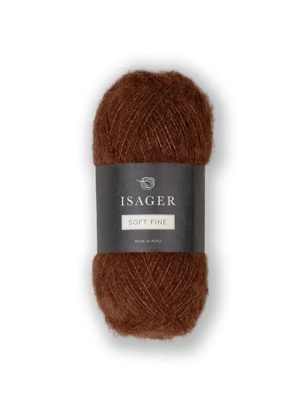 A skein of Isager Soft Fine, a soft brown alpaca-silk lace yarn with a dark gray and white label, is shown on a plain white background—perfect for refined projects.
