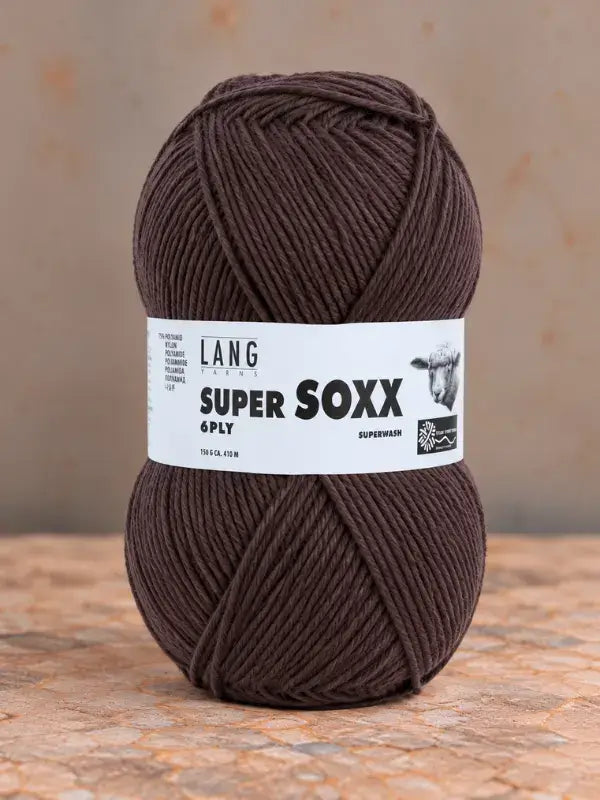 A ball of dark brown Lang Yarns Super Soxx 6 ply yarn with a label.