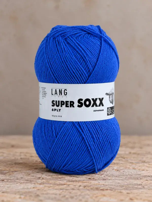 A skein of bright blue Lang Yarns Super Soxx 6 ply – kestävä sukkalanka villasta, a superwash wool yarn.