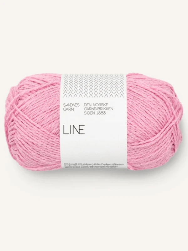 A skein of pink Sandnes Garn Line cotton yarn with a white label, shown on a light background—perfect for making the Elodie Tee neuleohje ENG.