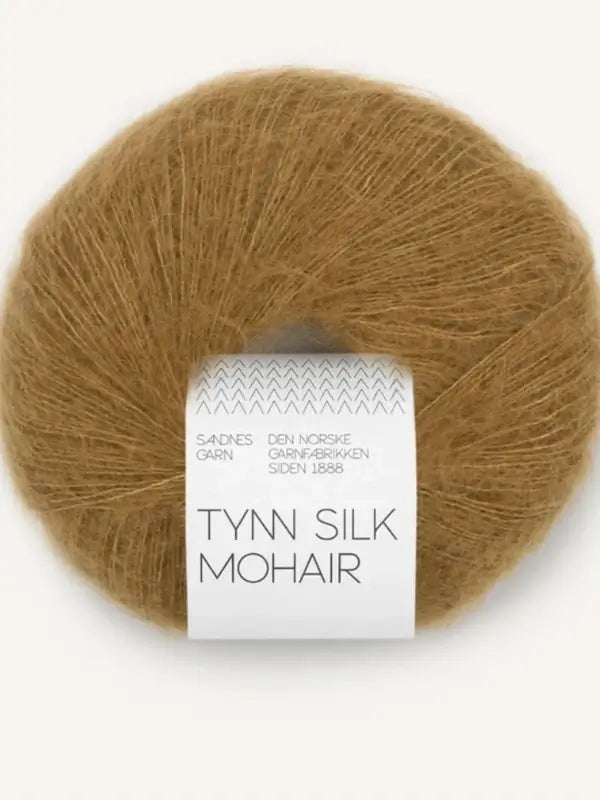 A ball of light brown Sandnes Garn Tynn Silk Mohair yarn with a white and gray wrapper displaying the brand and product information.