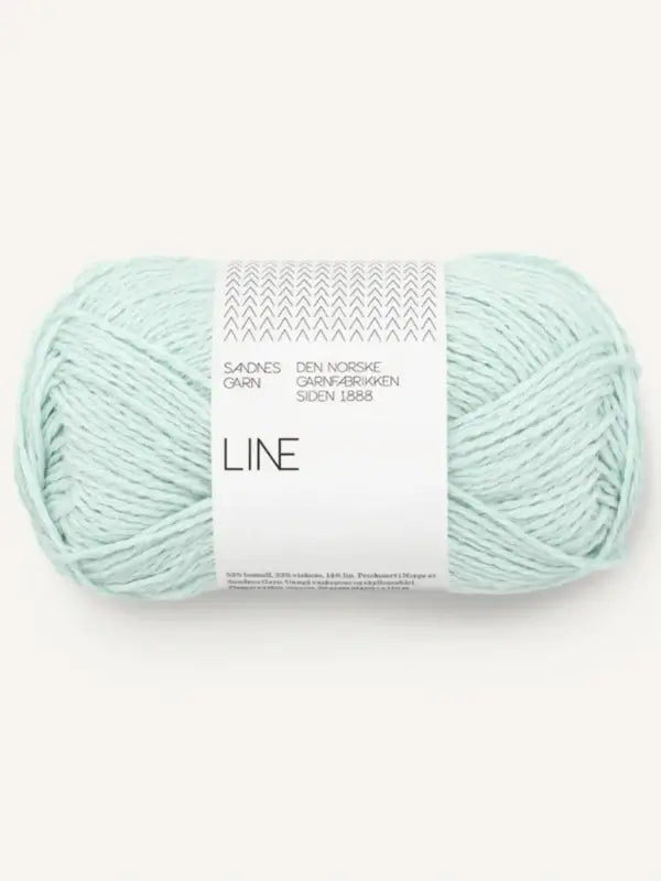 A light blue skein of Sandnes Garn LINE yarn for PetiteKnit Anker's Summer Shirt, featuring a white label with minimalist text design, placed on a plain light background.
