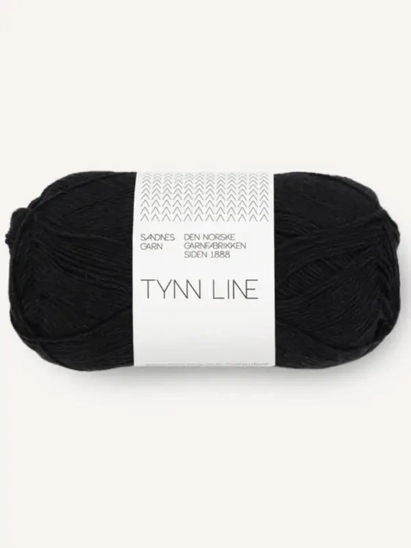 A skein of black Sandnes Garn Tynn Line fingering-weight yarn with a white label and Norwegian text, ideal for summer knit projects.